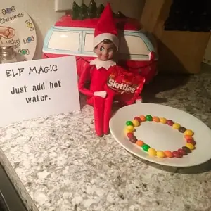 Elf magic trick with skittles