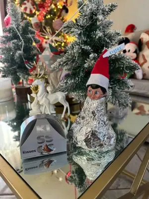 Elf disguises as a giant Hershey’s Kiss
