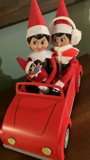 Elf family heads out on a Christmas road trip with their baby elf in tow